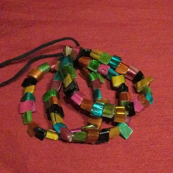 8 Coloured Bracelets - Picture 2 of 16